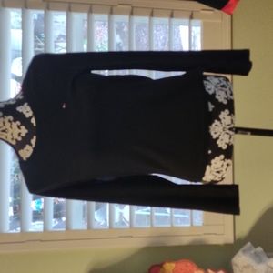 Tommy Hilfiger long sleeve tee shirt.  Large but fits more like a medium.